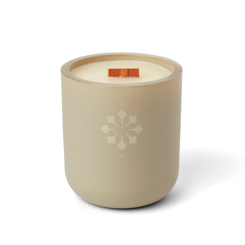 A cozy candle that evokes a feeling of nostalgia that is both warm and inviting, perfect for Fall.
