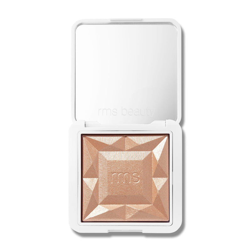 A multidimensional luminizer that gives a warm champagne glow that comes in a refillable mirrored compact.