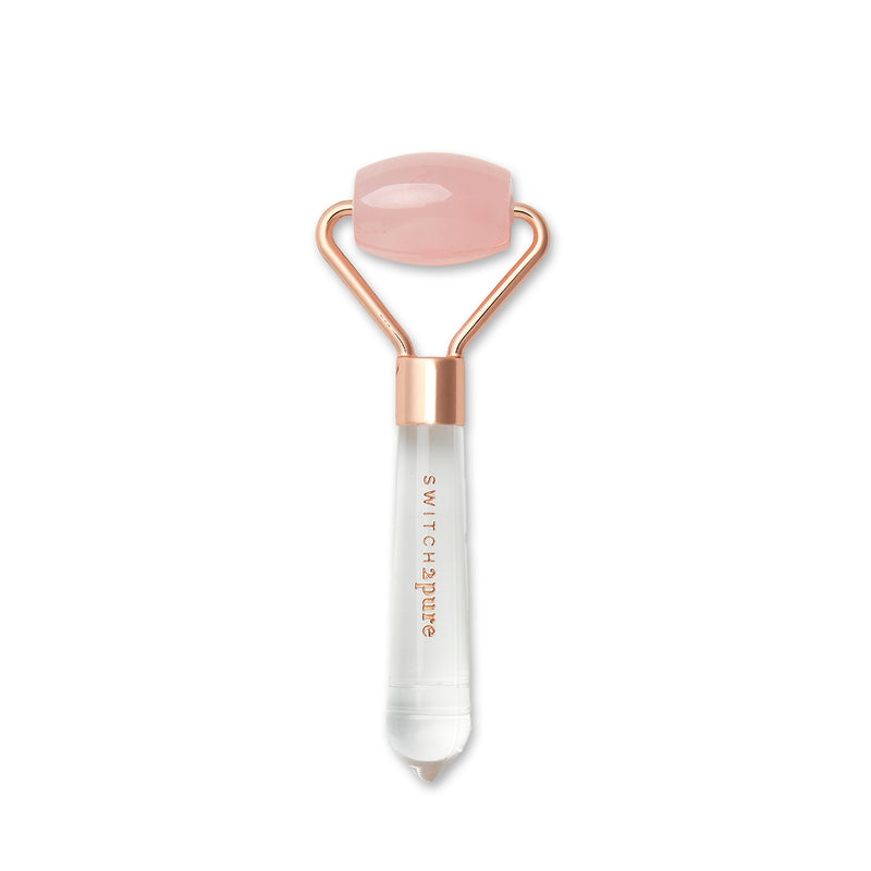 A small rose quartz crystal roller that helps to depuff, reduce the appearance of wrinkles, penetrate product, promote lymphatic drainage and under eye discoloration.