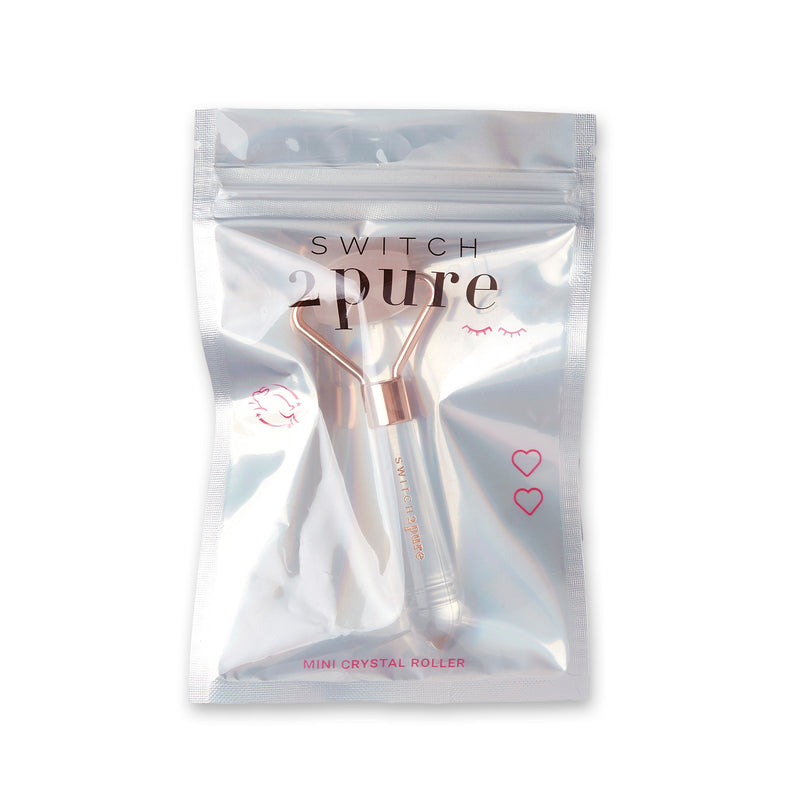A small rose quartz crystal roller that helps to depuff, reduce the appearance of wrinkles, penetrate product, promote lymphatic drainage and under eye discoloration.