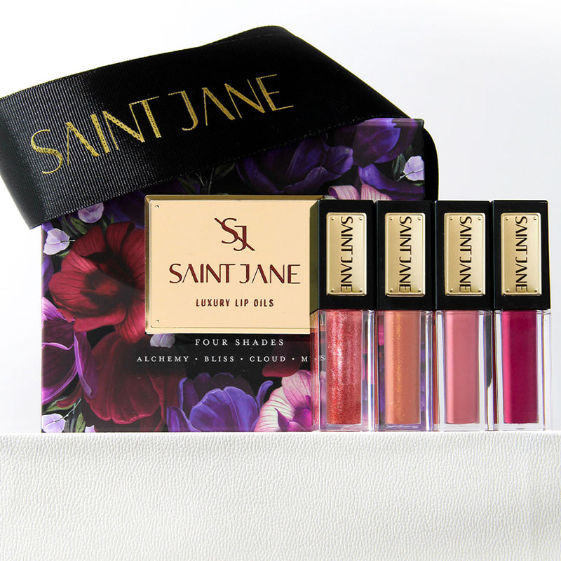 A Limited Edition Lip Oil Collection containing four full-sized glosses in Saint Jane’s best-selling shades.