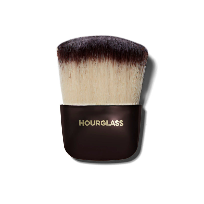 A powder brush that helps to evenly disperse liquid, cream, or powder makeup products all over the face.