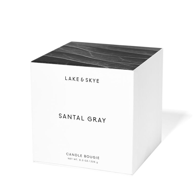 A soy candle with cozy and warm scent notes of sandalwood, violet leaf, musk, and cardamom.