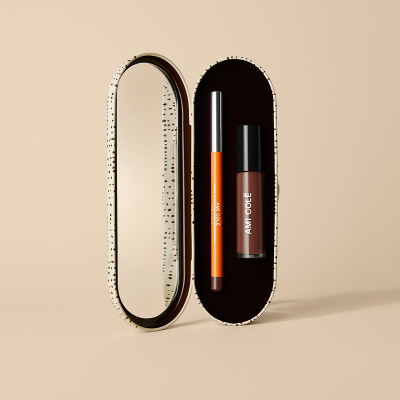 The Colé Lip Kit features Soft Shape Lip Liner and the bestselling Lip Treatment Oil housed in a chic tin perfectly designed to fit both products.