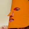 A playful yet powerful way to rejuvenate your skin. This LED mask uses red, blue, and purple light therapy to target acne, fade scars, and boost radiance for a healthier complexion.