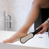 A foot file to slough away dead skin cells from your heels and around your feet.