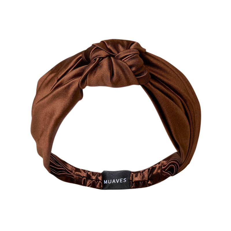 A silky satin headband that helps to protect and hold hair during your beauty routine and throughout the day.