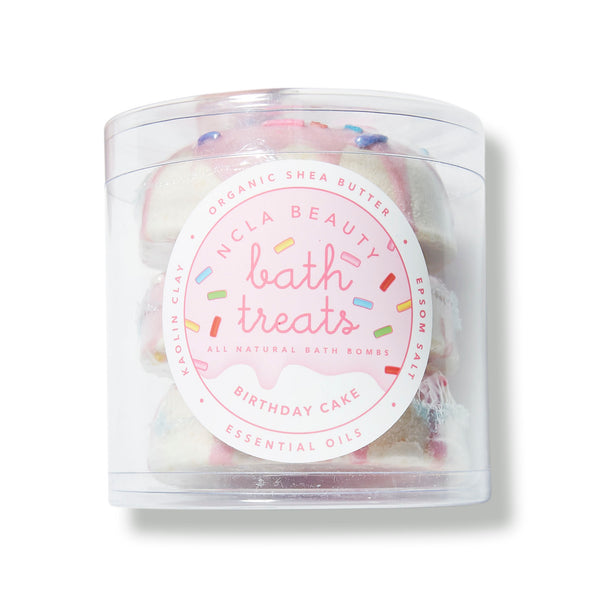 NCLA Beauty A trio of donut-shaped bath bombs in a birthday cake scent to leave skin ultrasoft.